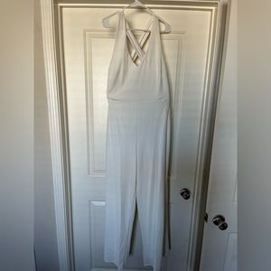 White jumpsuit, Large, with halter top and open back.